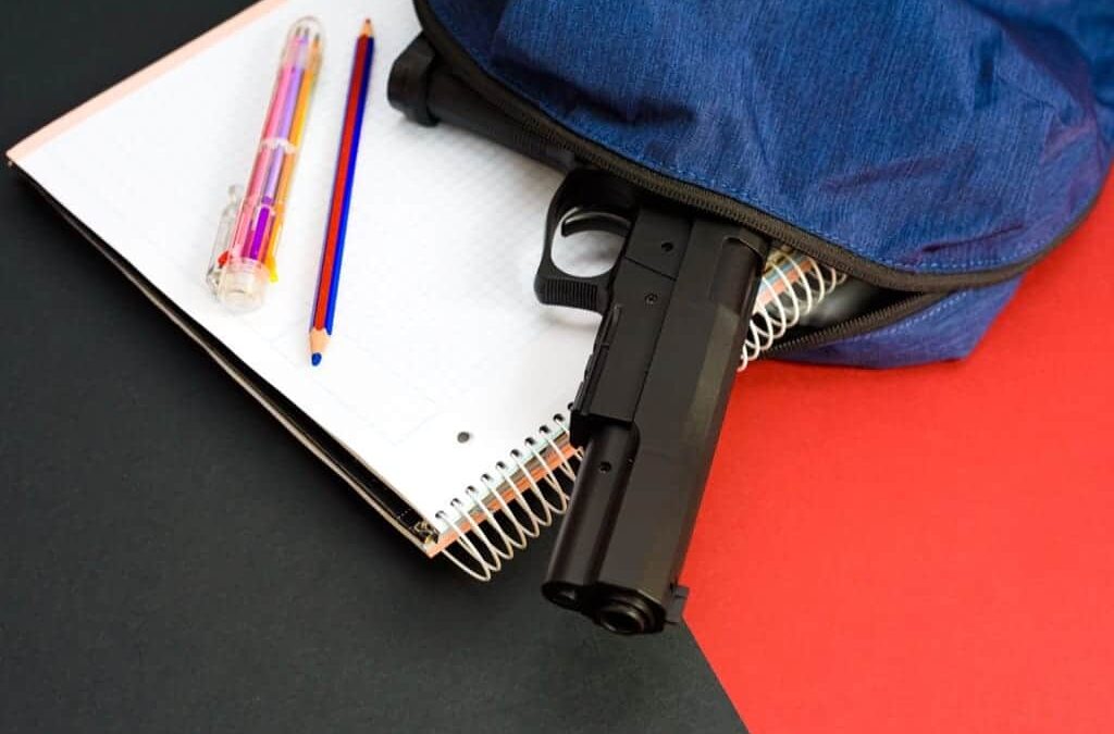 School shootings are an unfortunate reality of living in the US. Here's how to talk to your kids about them to keep them safe.